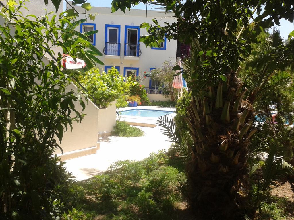 الشقق الفندقية Paradise Garden Gumusluk Evleri المظهر الخارجي الصورة