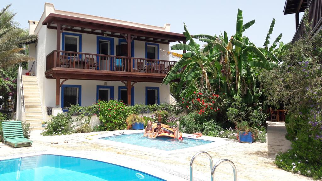 الشقق الفندقية Paradise Garden Gumusluk Evleri المظهر الخارجي الصورة