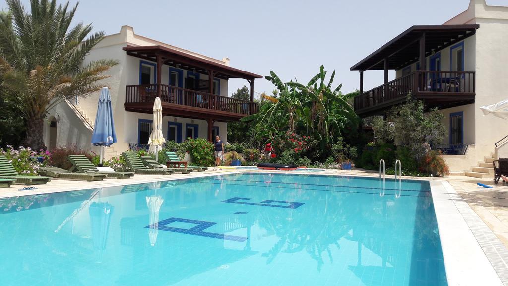 الشقق الفندقية Paradise Garden Gumusluk Evleri المظهر الخارجي الصورة