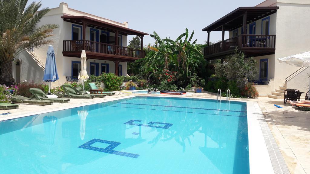الشقق الفندقية Paradise Garden Gumusluk Evleri المظهر الخارجي الصورة
