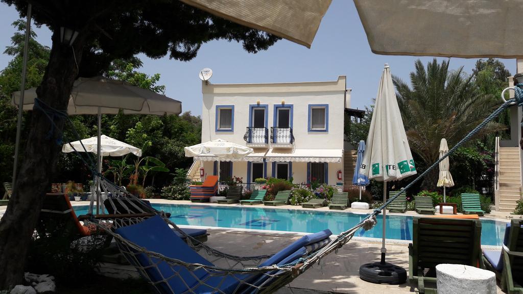 الشقق الفندقية Paradise Garden Gumusluk Evleri المظهر الخارجي الصورة
