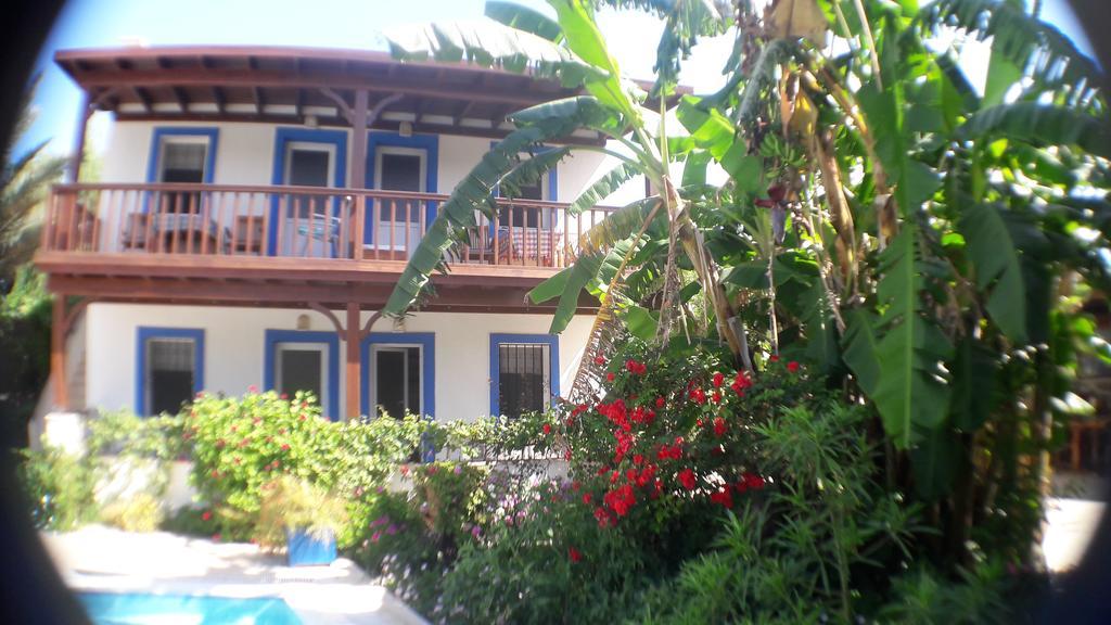 الشقق الفندقية Paradise Garden Gumusluk Evleri المظهر الخارجي الصورة
