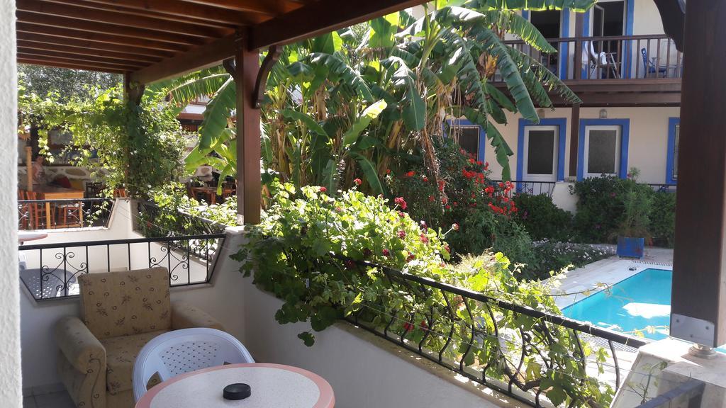 الشقق الفندقية Paradise Garden Gumusluk Evleri الغرفة الصورة