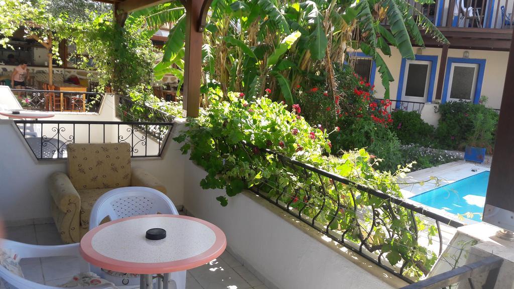 الشقق الفندقية Paradise Garden Gumusluk Evleri الغرفة الصورة